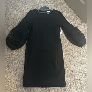 NWT chicos black dress. With cutout pattern. size 00. Originally $139.
